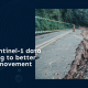 EarthConsole Stories banner about Copernicus Sentinel-1 satellite data and machine learning for ground movement monitoring, featuring a landslide-damaged forest road with cracked and collapsed asphalt.