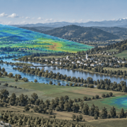 Satellite, drone and ground-based sensors collecting complementary measurements over a European river valley, with highlighted areas showing the different observation scales.